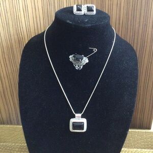 Three piece costume jewelry set marked RMN. Necklace, ring, and earrings